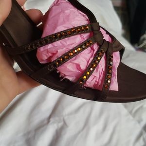 Brown low heels with diamond embellishments
